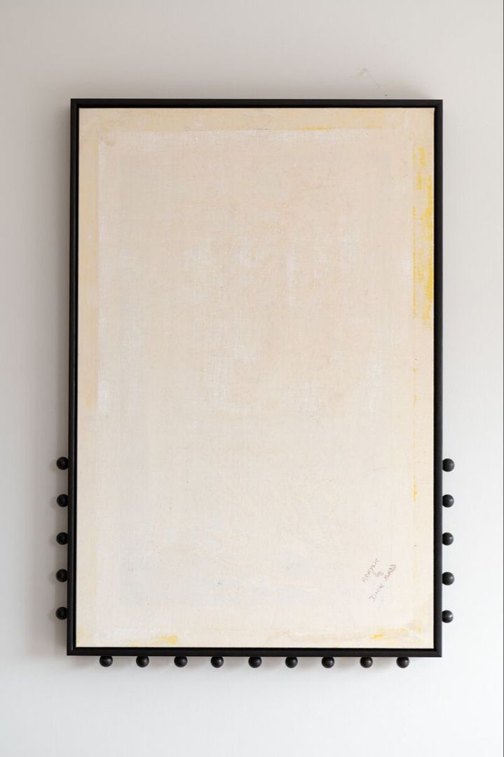 Framed panel with black iron ball detailing
