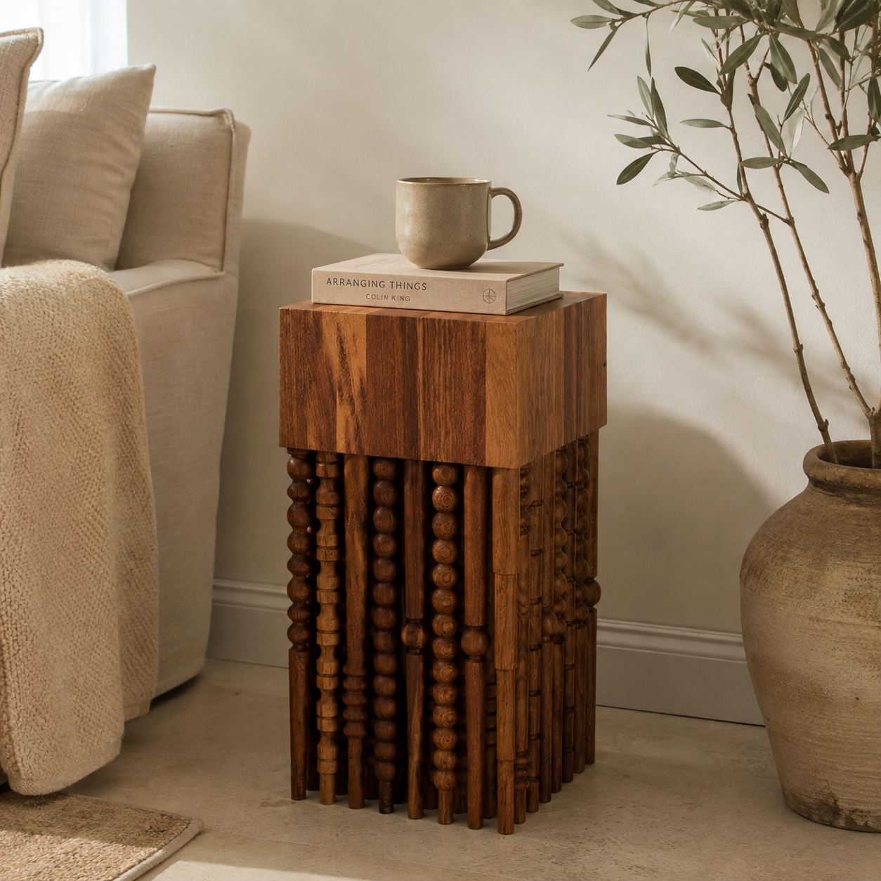 Turned wooden side table in a living room